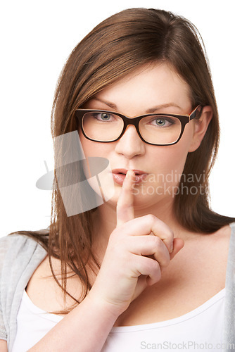 Image of Studio portrait and plus size model with secret for hush, gossip and privacy news with mystery by white background. Woman, face and emoji for shush with glasses, confidential and silence for noise