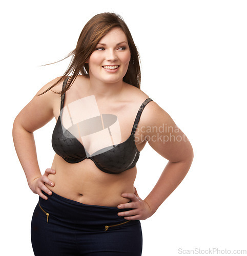 Image of Thinking, smile and bra with a plus size woman in studio isolated on a white background for body positivity. Idea, vision and a happy young model looking natural or confident in her underwear