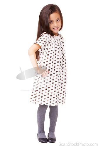 Image of Happy, child or portrait with smile or fashion on white background in studio with confidence. Hands on hips, cute female kid or full body of young girl in Italy with dress, pride or clothes in style