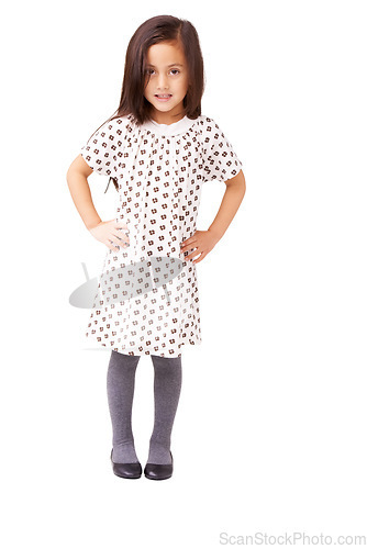 Image of Studio, child or portrait with smile or fashion on white background with confidence or growth. Hands on hips, cute female kid or full body of young girl in Italy with dress, pride or clothes in style