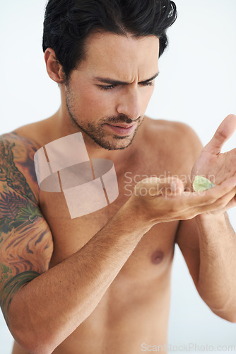 Image of Nature, wildlife and a shirtless man with a butterfly in his hands for fragile, delicate or gentle care. Body, ecology or conservation and a young person holding a flying insect to nurture in trust