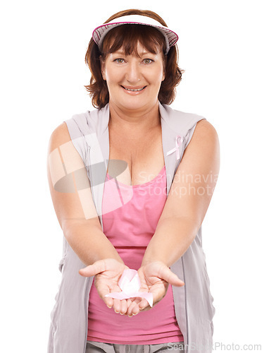 Image of Mature portrait woman, breast cancer ribbon and show studio bow for awareness, kindness or activism support. Health wellness care, disease survivor or person giving compassion on white background