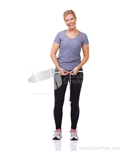 Image of Fitness, measuring tape and portrait of woman with smile, workout and wellness with healthy body in studio. Health, exercise and happy girl with weight loss measurement isolated on white background.