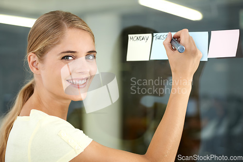 Image of Woman, planning and sticky notes on glass, calendar and smile for writing, creative and portrait. Presentation, strategy and office job for schedule, workplace and marketing agency report process