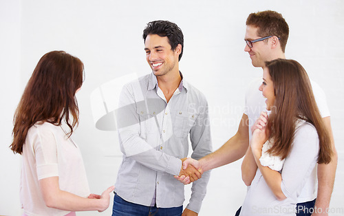 Image of Happy business people, handshake and introduction for teamwork, success and b2b agreement, acquisition deal or praise. Employees shaking hands for partnership, collaboration and welcome to onboarding