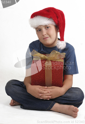 Image of Sitting boy with Christmas Gift