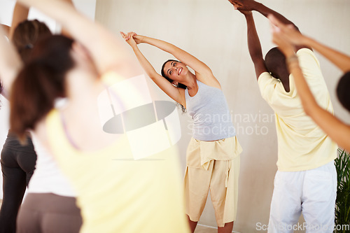 Image of Stretching, yoga and group with personal trainer for class balance, exercise and workout together. Pilates, health club and men and women with instructor for wellness, fitness and healthy body