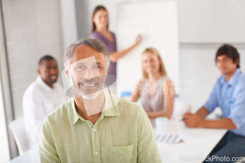 Image of Presentation meeting, business portrait and mature man smile for sales mentoring, workshop training or project management. Teamwork mentor, happiness and boss happy for employees brainstorming plan