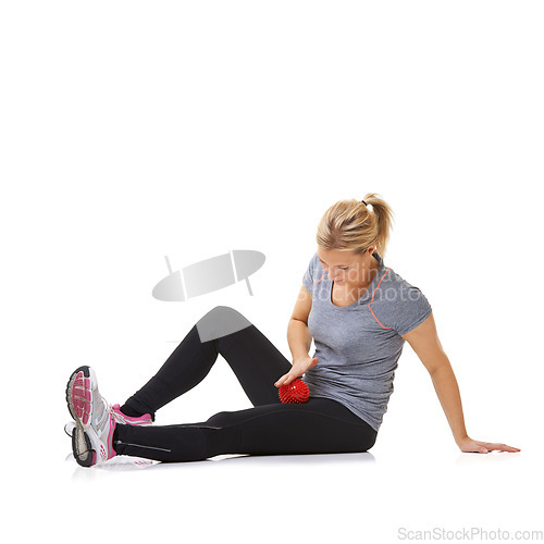 Image of Woman, massage ball and healing injury in studio, care and health or wellness by white background. Female person, athlete and physical therapy or rehabilitation for muscles in legs and body in mockup