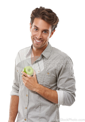 Image of Portrait, smile and man with apple, food and healthy diet isolated on a white background in studio. Face, happy person and green fruit for nutrition, vegan and wellness benefits, vitamin c or organic