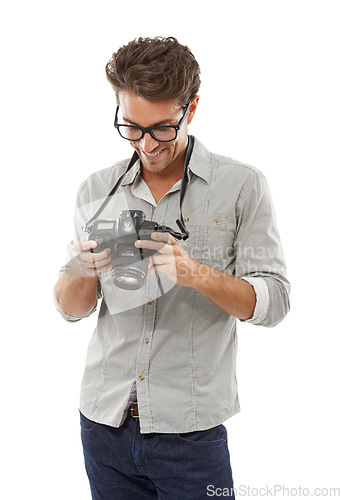 Image of Photographer man, camera and thinking in studio with smile for journalist job by white background. Reporter person, newspaper employee and happy for media, paparazzi or check picture for news story