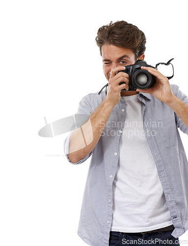 Image of Photographer man, camera and click in studio with vision for shooting job by white background. Reporter person, newspaper employee and journalist for media, paparazzi and photoshoot for news story