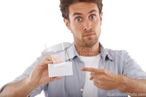 Image of Portrait, surprise and man pointing at card, mockup and advertising space isolated on a white studio background. Face, shock and show blank paper for promo, info or commercial, marketing or hand sign