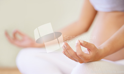 Image of Pregnant woman, yoga meditation and hands in studio with relax wellness and mindfulness for prenatal care. Young person, zen or lotus pose for breath exercise in maternity training or peace in class