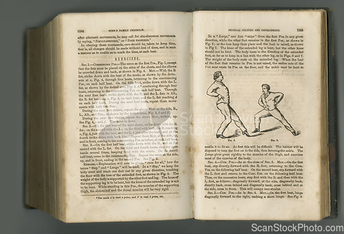 Image of Old book, vintage and fitness guide of antique manuscript, scripture or ancient literature on exercises against a studio background. Closeup of historical novel, journal or classic workout history