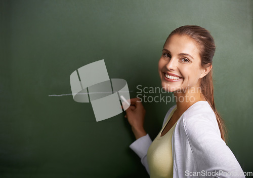 Image of Woman, teacher portrait and drawing on chalkboard for education, learning information and teaching. Face of a young professor, lecturer or class educator writing a line on board for school knowledge