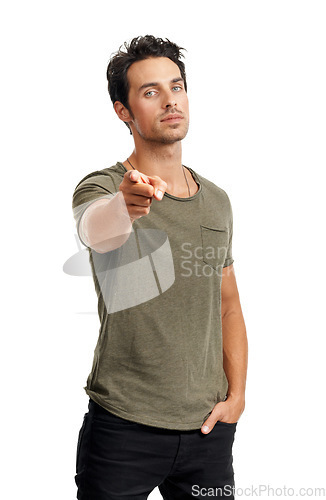 Image of Serious, pointing and portrait of man in a studio for choice, vote or decision with confidence. Selection, fashion and handsome young male model with a show hand gesture isolated by white background.