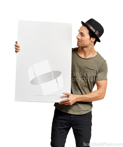 Image of Poster, mockup and information with a hipster man in studio isolated on a white background for marketing. Space, sign or placard with a confident young person holding a billboard for an announcement