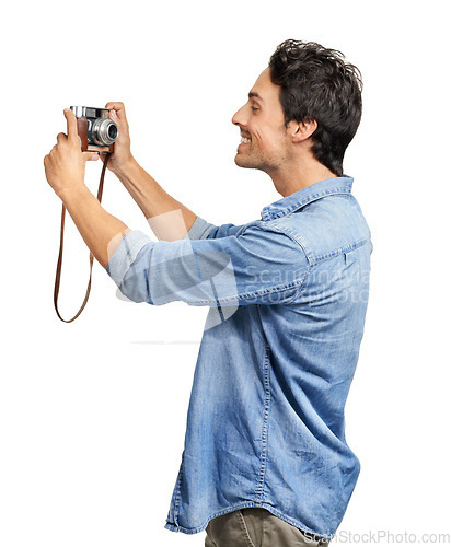 Image of Selfie, smile and retro camera with a man in studio isolated on a white background for photography. Profile, hobby and vintage technology with a happy young photographer posing for a picture