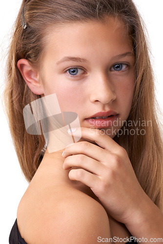 Image of Teenager portrait, skincare and kid touch, feel or check skin treatment results for acne, melasma or pimple protection. Dermatology skin wellness, face collagen and studio girl on white background