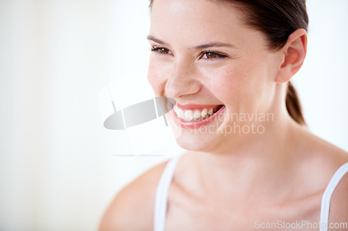 Image of Happy, portrait and woman with skincare from beauty, cosmetics and white background in studio. Model, smile and person with luxury dermatology, facial and skin glow from wellness in spa or salon