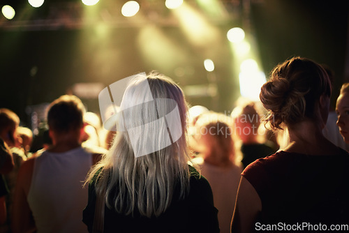 Image of Back view, night or people in concert or music festival on holiday vacation to relax with freedom. Dance, disco lights or girl friends in social club or youth culture for fun party celebration event