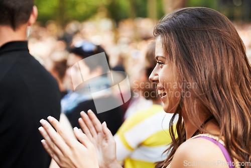 Image of Crowd applause, outdoor festival and happy woman having fun, happiness and smile at group social gathering. Music concert, audience profile and excited girl vacation, entertainment or clap at event