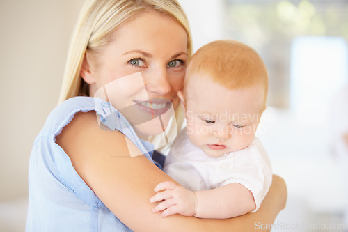 Image of Portrait, happiness and home mother, baby or family for newborn child growth, youth development or wellness. Happy face, smile and mom holding, hug or embrace kid for bonding, nurture or love