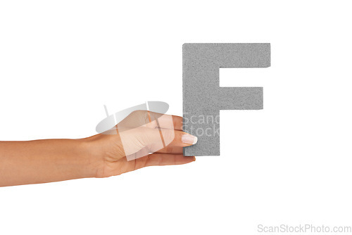 Image of Hands, capital letter and F in studio for alphabet, font sign or learning english language on white background. Closeup, woman or text design, typography or character of grammar, teaching or spelling
