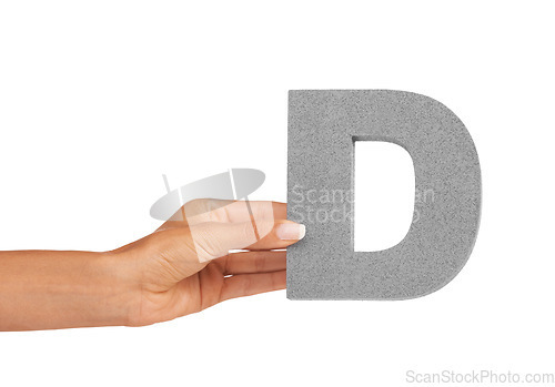 Image of Hand of woman, capital letter D and presentation of consonant isolated on white background. Character, font and palm with English alphabet typeface for communication, reading and writing in studio.