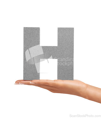 Image of Hand of woman, font letter H and presentation of consonant isolated on white background. Character, uppercase and palm with English alphabet typeface for communication, reading and writing in studio.