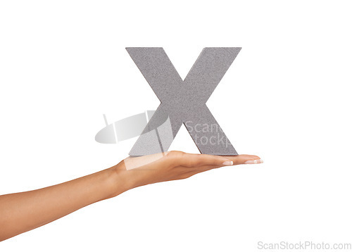 Image of Woman, hand and x letter or alphabet in studio for marketing, learning or teaching on mock up. Sign, font or character for marketing, text or communication and grammar or symbol on white background