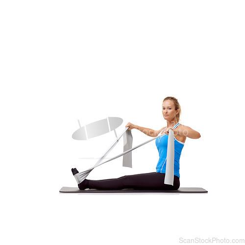 Image of Fitness, resistance band and portrait of woman doing exercise in studio for health, wellness and bodycare. Sport, yoga mat and person from Canada with arm workout or training by white background.