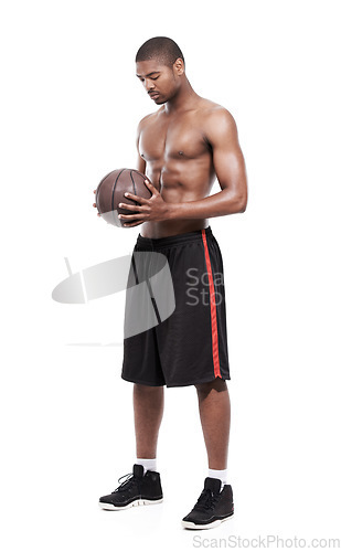 Image of Fitness, sport and shirtless black man with basketball, six pack and body for muscle workout challenge. Wellness, health and professional athlete thinking with ball isolated on white background.