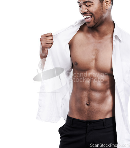 Image of Man, fashion and happy with abs, sexy and dressing for chest, african and male model in white background. Alone, smile and muscles with six pack, shirt and corporate wear, stylish and masculine