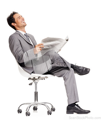 Image of Business man, laughing and reading newspaper in studio, headlines and information on current events. Businessperson, happy and knowledge or announcement on paper, news and update by white background