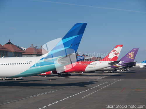 Image of Tailplanes of Airbus and Boeing airplanes in Bali