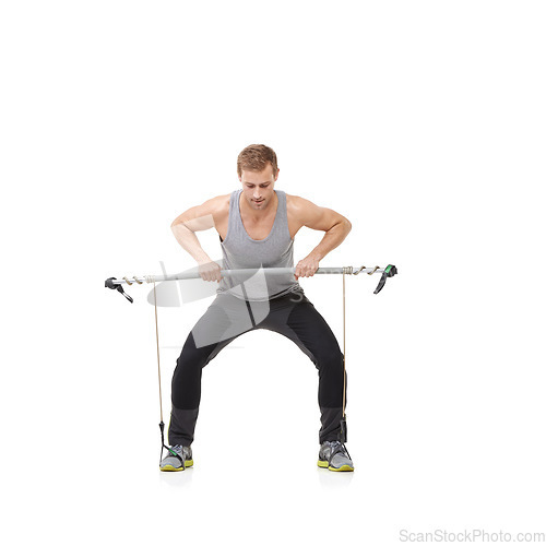 Image of Fitness, workout and resistance band with a strong man in studio isolated on a white background for health. Gym, exercise or performance and a young athlete training with equipment for wellness