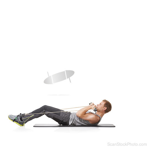 Image of Exercise, man and resistance band with fitness, energy or wellness isolated on white studio background. Mockup space, person or model with workout, health or progress with cardio, crunch or endurance