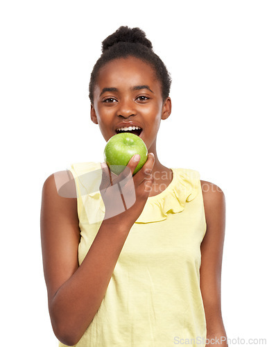 Image of Eating, smile with portrait of girl and apple in studio for nutrition, wellness and diet. Food, self care and vitamin c with face of African student and fruit on white background for fiber and health