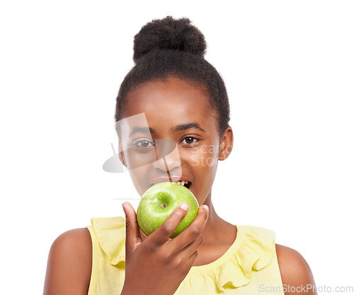 Image of Eating, wellness and portrait of girl and apple in studio for nutrition, health and diet. Food, self care and vitamin c with face of African teenage child and fruit on white background with a smile