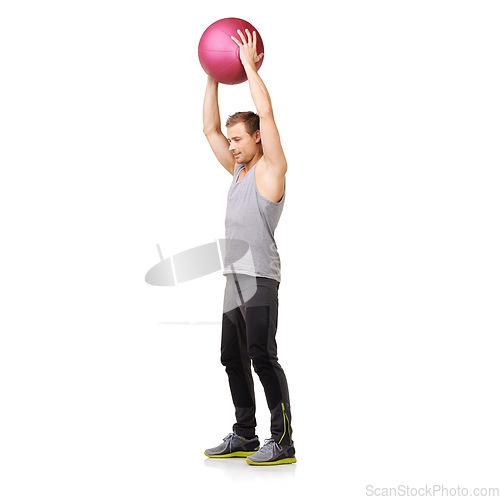 Image of Man, medicine ball and gym workout in studio for training exercise, balance goal or white background. Male person, sports equipment and muscle fitness or mockup space for healthy, cardio or strong