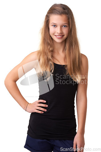 Image of Portrait, smile and teen children for fashion with a blonde girl in studio isolated on a white background. Model, trendy or style and a happy young kid looking confident in a casual clothing outfit