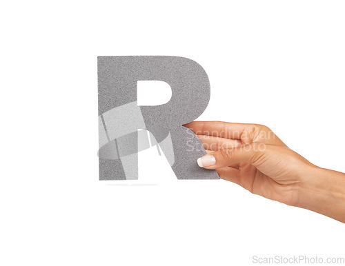 Image of Woman, hand and letter R or alphabet in studio for advertising, learning and teaching presentation. Sign, font and character for abc, text or communication and grammar or symbol on white background