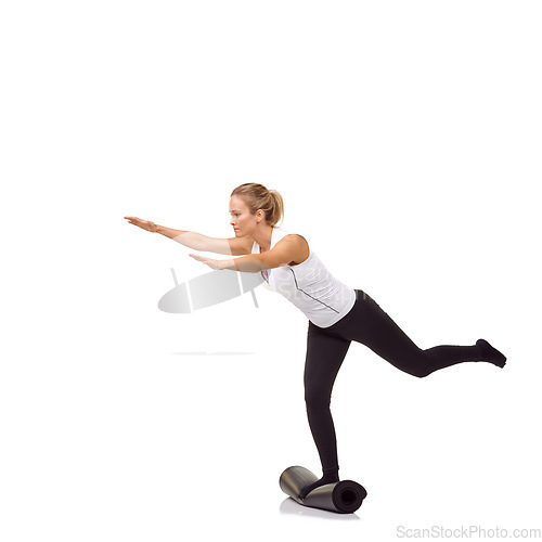 Image of Woman, exercise and mat in studio for balance, pilates or workout for healthy body, wellness or fitness. Person, face and yoga in sportswear for physical activity on mock up space or white background