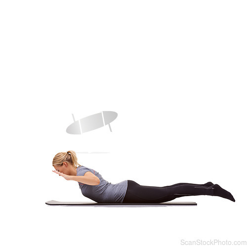 Image of Woman, back extension and yoga exercise in studio for fitness, workout and stretching body on mockup white background. Profile of healthy lady balance on mat for strong core, training and locust pose