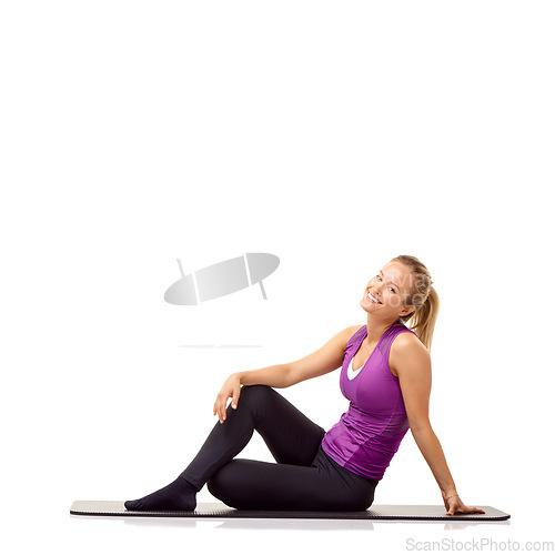 Image of Woman, fitness and happy portrait on floor in studio for yoga, performance and healthy body isolated on white background. Wellness, workout and strong lady smile on mat for exercise, power and mockup