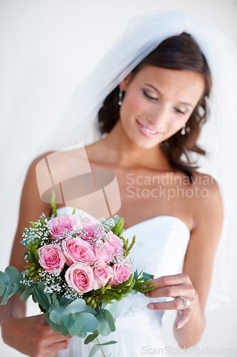 Image of Woman, flower bouquet and wedding dress for marriage celebration, love promise or diamond ring. Female person, plant or veil or elegant gown for floral romance, partnership bride or commitment event