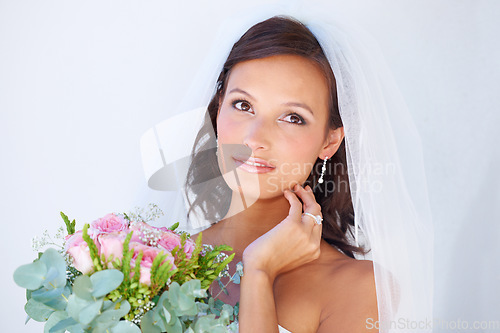 Image of Smile, wedding and young woman with flowers for luxury marriage ceremony, party or reception. Happy, love and beautiful bride from Mexico with makeup and floral bouquet for romantic celebration.