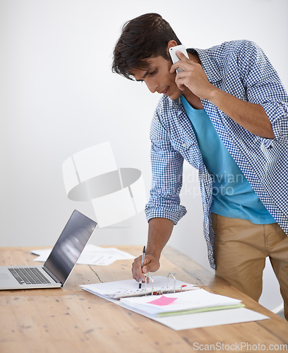 Image of Business man, phone call and reading documents, folder or paperwork for planning, accounting and financial advice. Professional worker talking on his mobile for startup information or tax management